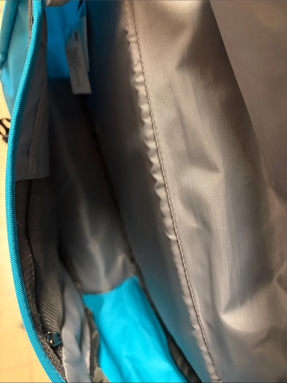 Patagonia Bright Turquoise Messenger Bag with Reflective Strip